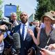 Sen. Tim Scott (R-SC) speaks to reporters as he leaves a meeting with Republican presidential candidate Donald Trump at the Republican National Senatorial Committee on July 7, 2016 in Washington, DC. (
